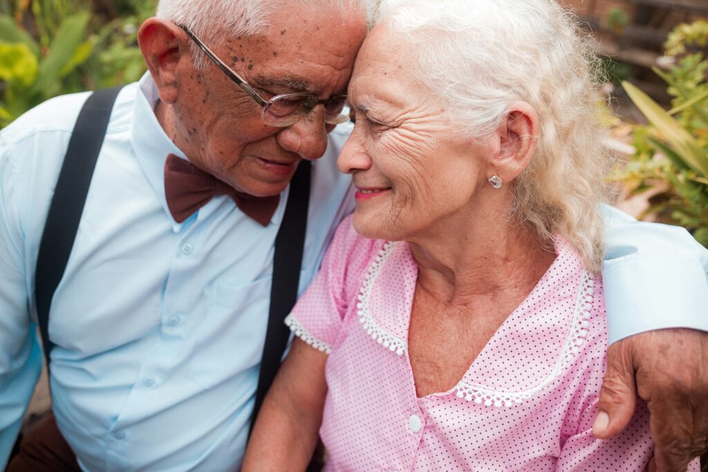 Senior couple sitting together in an Irvine California park