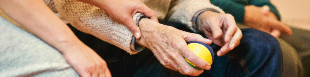 seniors holding hands in a senior living facility in orange county, California